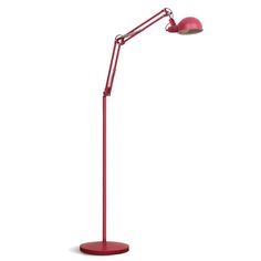 a red floor lamp on a white background with the light turned on and one arm extended