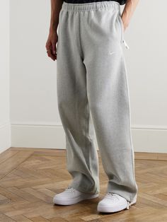 Cut from cotton-blend jersey, Nike's sweatpants are embroidered with the signature 'Swoosh' just below the elasticated waistband. There are drawstrings at the cuffs so you can wear them loose and straight or drawn for a more tapered shape. Nike Collection, Nike Sweatpants, Mr Porter, Logo Embroidered, Porter, Straight Leg, Sweatpants, Cotton Blend, Nike