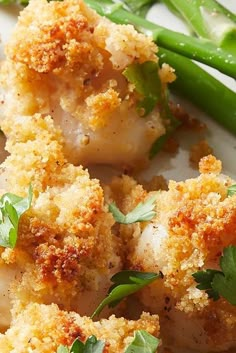 scallops and asparagus on a plate with parmesan bread crumbs