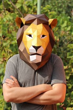 Lion low poly 3D mask, medium assembly. Each color on a separate page, + visual instruction 16 pages: A4 1-4 gold 5 black 6 white 7-16 brown + Step-By-Step Instruction + Visual Instruction All masks are standard size and fit for adults. But if you zoom out by 10% or 20% when you print, the mask will be smaller and better suited for children. There is a lot of free space inside the mask, so a cardboard ring is used to attach to the head, a ring template is included. You can easily fit the head ri Papercraft Mask, Low Poly Mask, Cardboard Mask, Mask Paper, 3d Mask, Lion Mask, Mask Template, Paper Mask, Papercraft Templates