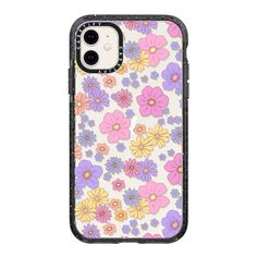 an iphone case with colorful flowers on the front and back cover in pink, blue, yellow