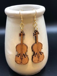 Violin or viola laser cut wood stained earrings . Sure to be admired or appreciated as a gift. Laser Cut Wood, Staining Wood, Violin, Jewelry Earrings Dangle, Laser Cut, Etsy Earrings, Dangle Drop Earrings, Dangle Earrings, Jewelry Earrings