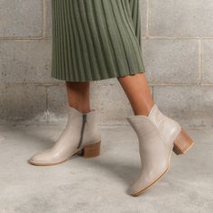 Step into effortless style with the Mockas Taupe Leather Ankle Boots by Django & Juliette. Crafted from soft and durable leather, these smart heeled boots feature a modern curved top and oval toe. With a medium-sized block heel for stability and a padded footbed for comfort, they're perfect for any occasion, day or night. Heeled Espadrilles, Mid Heel Boots, Patent Boots, Low Heel Boots, Taupe Leather, High Heel Boots Knee, Lace Up Flats, Low Heel Sandals, Ankle Boots Flat