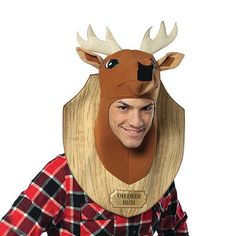 a man wearing a deer mask with horns on it's head and plaid shirt