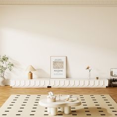 a living room with a coffee table and rug