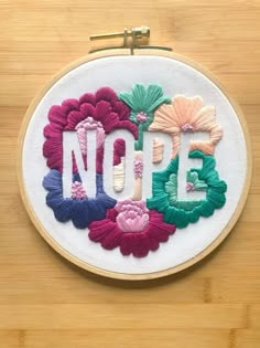 there is a embroidery with the word nope on it