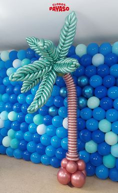 there is a palm tree made out of balloons