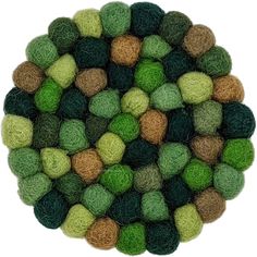 green and brown wool balls arranged in the shape of a circle on a white background