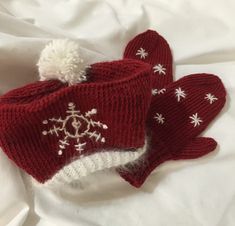 "Elegant and extra warm 100% wool knitted holiday and winter themed tasseled hat and matching mittens, trimmed in 100% angora.  Embellished with snowflakes, making this set perfect for holiday pictures and special holiday occasions. Sized child medium. Dimensions:  Hat 16\" (40.64cm) at the brim, height 7\" (17.78cm) without pompom Mittens: 7 1/5\" (19.05cm) long, 5 1/4\" (13.33cm) at the wrist Care: Hand wash cold, lie flat to dry Patterns from: \"Knit One Embellish Too\" by Cosette Cornelius B Red Winter Hat As A Gift, Red Winter Hats For Gifts, Hand Knitted Hat For Winter Gift, Winter Wool Hat As Gift, Child Hat, Knit Stockings, Stocking Ornament, Winter Themed, Holiday Pictures