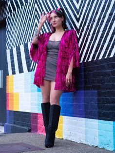 "Welcome to the most fabulous fringe jacket you'll ever lay your eyes on! This Fuchsia Tinsel Fringe Crop Jacket is the ultimate showstopper that will make you shine like a star. The dazzling fuchsia tinsel fabric catches the light in all the right ways, while the playful fringe adds movement and texture to your look, making you the center of attention at any party. Perfect for a night out with the girls, a concert, or a daring fashion statement, this crop jacket is the epitome of fun and flirty Party Outerwear With Tassels, Fall Party Outerwear With Tassels, Glamorous Pink Outerwear For Night Out, Fitted Party Outerwear With Fringe, Winter Party Outerwear With Tassels, Fitted Fringe Outerwear For Parties, Long Sleeve Fringe Outerwear For Party, Winter Fringe Outerwear For Night Out, Long Sleeve Party Outerwear With Tassels