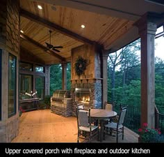 a covered patio with table and chairs next to an outdoor fireplace in the middle of it