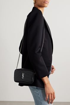 SAINT LAURENT's 'Lou' shoulder bag is easily identifiable by the chevron matelassé leather and polished 'YSL' plaque. Made in Italy, it has a slip pocket at the back and opens to reveal three card slots and enough space inside for your phone, lipstick and keys. The slender chain strap is ideal for wearing across the body or on the shoulder. Ysl Crossbody Belt Bag, Ysl Black Cross Body Bag, Ysl Camera Bag Mini, Ysl Mini Nolita Bag, Sade Mini Tube Bag Ysl, Ysl Bag Solferino, Ysl Bag Mini Lou, Ysl Mini Lou Bag Outfit, Ysl Mini Lou Bag