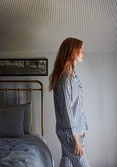 Our classic Marina Pajama Set is designed to be worn inside or outside of the bedroom. The top is comfortably oversized with a chest pocket and piping at the placket, cuffs, and pocket. The pant has two side pockets, a button fly and waist with adjustable drawstring, and slim piping trim along the outside seams. Both are made in a super-soft fine cotton fabric. Striped Pajama Set, Sleepy Jones, Pj Party, Breton Stripes, Striped Pyjamas, Women Nightwear, Kids Style, Pajama Bottoms, The Bedroom