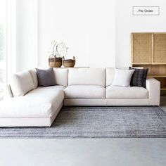 a living room with a large white couch