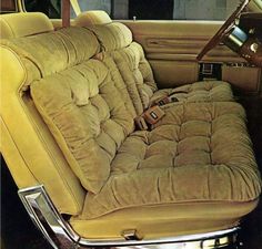 the interior of an old car is clean and ready to be used as a seat