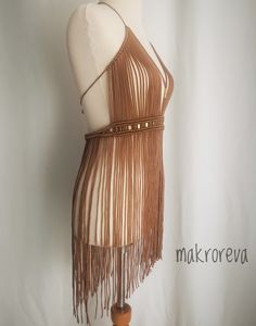 Brown Sleeveless Fringe Dress, Sleeveless Brown Fringe Dress, Sleeveless Brown Dress With Fringe, Bohemian Beige Mini Dress For Festival, Beige Bohemian Mini Dress For Festival, Brown Summer Festival Dress, Brown Summer Dress For Festivals, Fitted Bohemian Mini Dress With Fringe, Fitted Brown Bohemian Mini Dress