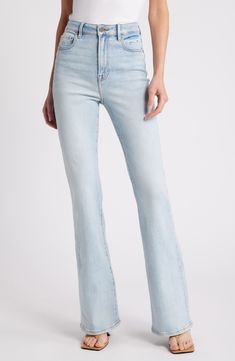 Cleanly styled for a casual-chic look, these light-wash flare jeans are made from stretchy denim with a high waist and full-length legs. 34" inseam; 11 1/2" front rise Zip fly with button closure Five-pocket style 93% cotton, 5% polyester, 2% spandex Machine wash, tumble dry Imported Luxury Light Wash Rigid Denim Flare Jeans, Cheap Light Wash Jeans With Buttons, Luxury Light Wash Flare Jeans With Belt Loops, Luxury Washed Flare Jeans In Rigid Denim, Luxury Light Wash Straight Hem Jeans, High Rise Light Wash Flare Jeans, Luxury Light Wash Rigid Denim Bottoms, Luxury Light Wash High Rise Flare Jeans, Luxury Medium Wash Cotton Flare Jeans