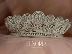 Looking for a unique bridal tiara design? Take a close look at this bridal headpiece, then close your eyes and picture it with your beautiful white dress. Looks stunning. With its amazing design, it will add to your bridal glow. This one goes with a veil as well which makes it the best choice for all scenarios.  Materials & Color: Cubic Zirconia, Silver-plated Measurement: approximately 6 cm wide.  FREE SHIPPING WORLDWIDE ( Please provide your phone number to make accurate shipping ) NOTE: Although preparing the items is estimated to be between (2) to (10) business, most of our orders are shipped within 3 business days. Thanks for checking our item. It means a lot to us to make bridal accessories and jewelry that add to the happiness of women around the world. Please check the rest of our Unique Bridal Veils And Headpieces, Wedding Tiaras And Crowns, Bridal Crown And Veil, Tiaras And Crowns Wedding, Silver Wedding Headpiece, Glittery Jewelry, Tiara Design, Black Tiara, Bridal Veils And Headpieces