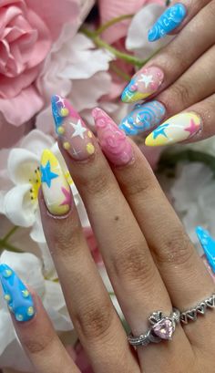 Pink,yellow and blue y2k nails by @nailsby_lubjana on instagram, designed by @designs.by.alex on instagram Pink Yellow Blue Outfit, Yellow Blue Nails, Pink And Yellow Nail Designs, Y2k Nails Blue, Blue Yellow Nails, Yellow And Blue Nails, Blue And Yellow Nails