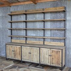 an old wooden bookcase with metal and wood shelves