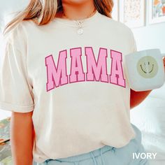 comfort colors mama shirt, cute mama shirts, mama shirt, mama tshirt ❤ COMFORT COLORS - ADULT UNISEX - SHORT SLEEVE T-SHIRT - 1717 > 6.1 oz./yd² (US), 10 oz/L yd (CA), 100% ring-spun cotton, 30 singles > Garment dyed for that lived in feel and almost no shrinkage at home. > Soft ring-spun cotton fabric with 100% cotton threads > Relaxed fit > Topstitched, classic width, rib collar > Shoulder to shoulder twill tape > Signature twill label > Made With Respect Proud member of the U.S. Cotton Trust Protocol > Made with OEKO-TEX certified low-impact dyes > Our clean pigment dye colors are salt free ❤ This product meets the following Sustainable Style subcategories: > Sustainable Manufacturing  > Socially Conscious Manufacturing > Shade variations are inherent in the pigment dye process. > Pigme Mama Tshirts, Salt Free, Dye Colors, Sustainable Manufacturing, Mama Shirts, Sustainable Style, Comfort Colors Shirt, Mama Shirt, Unisex Shorts