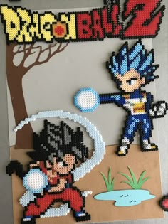 the dragon ball game is made out of perler beads and plastic bead threads