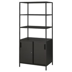 a black bookcase with two doors on the bottom and one door open to reveal a cabinet