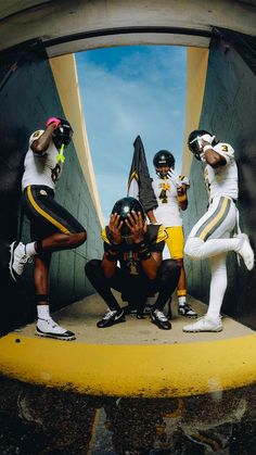 a group of football players standing next to each other