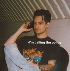 a man sitting down talking on a cell phone with the caption i'm calling the police