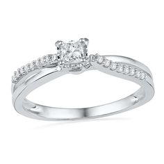 a white gold engagement ring with diamonds on it