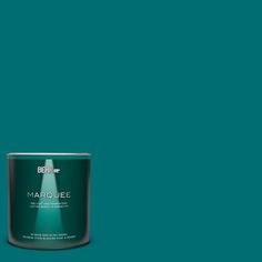 a can of marquee green paint on a green background with the word marquee written below it