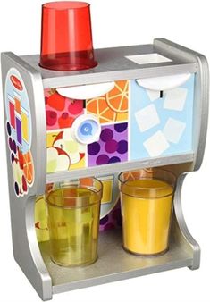 a toy juice dispenser with cups on it