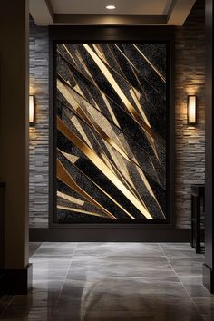 an abstract art piece is displayed on the wall in this modern hallway with black and gold accents