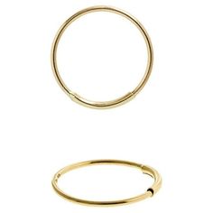 two gold rings are shown against a white background, one is empty and the other has no