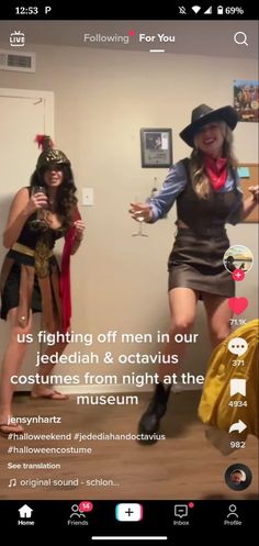 two women dressed up in costumes are dancing