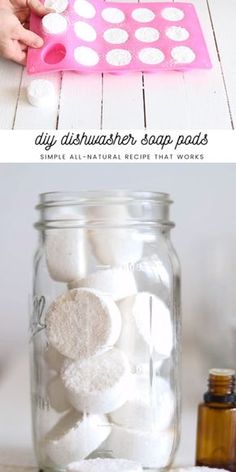 a jar filled with white marshmallows sitting on top of a table