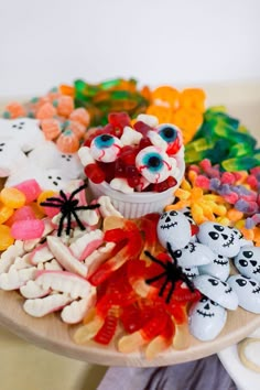 there is a plate full of halloween candies on the table