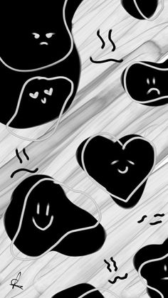 black and white illustration of hearts with faces drawn on them, in the middle of wood planks