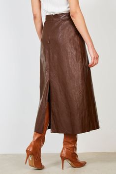 - Fit: Small to size- Materials: 95% polyester, 5% polyurethane- Thickness: Moderate- Sheerness: None- Stretch: Low- Lining: None- Care: Gentle wash cold and dry in shade London Free, Buy Now Pay Later, Midi Skirt, London, Skirt