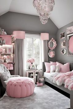 a bedroom decorated in pink and grey with chandelier hanging from the ceiling, round ottoman on carpeted floor