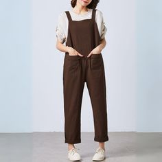 Experience comfort and style with our loose, baggy overalls in earthy brown for women. Fashioned from high-quality linen, they ensure breathability and durability.  ★★FEATURES - 100% Linen fabric - Two front patch pockets, two back patch pockets - Wide-legged overalls - Loose fitting overalls - harem overalls - Maternity overalls - minimalist overalls - Comfortable and casual backless trousers for a variety of everyday occasions in the kitchen, picnic, garden and painting. - Dry Clean ★★Bespoke Harem Overalls, Overalls Loose, Overalls Brown, Brown Overalls, Baggy Overalls, Wide Leg Overalls, Picnic Garden, Maternity Overalls, Loose Overalls