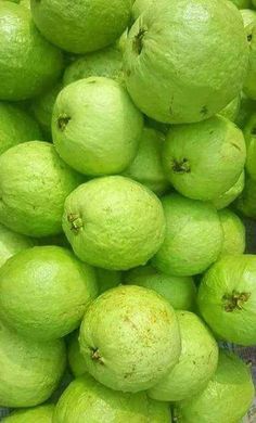 a pile of limes sitting next to each other