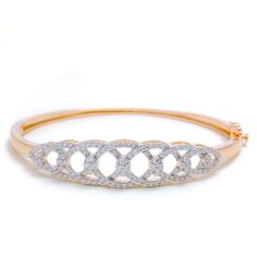 This exquisite 18k rose gold bangle bracelet, weighing 10.2 grams, features a stunning tapered design adorned with dazzling diamonds. The rose gold finish enhances its luxurious appeal, making it perfect for any special occasion. The bangle is set with 0.90 carats of F-G color, VS quality diamonds in round brilliant cut shapes. With an oval opening of 2.25 inches, this piece offers both elegance and comfort. The bangle is openable, designed with a push snap lock and clasp for added convenience. Rose Gold Bracelet With Diamond Accents For Anniversary, Anniversary Rose Gold Bracelet With Diamond Accents, Diamond Bangle In Rose Gold With Pave Setting, Rose Gold Diamond Bracelet With Diamond Accents, Rose Gold Diamond Bangle With Pave Setting, Classic Rose Gold Bangle With Diamond Accents, Rose Gold Bangle Bracelet With Brilliant Cut, Rose Gold Bracelet With Diamond Accents For Wedding, Rose Gold Brilliant Cut Bangle For Weddings