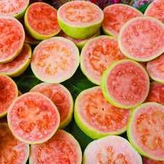 grapefruit, oranges and lemon slices on a marble counter with mint sprigs