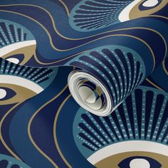 a blue and gold wallpaper with an abstract design on the back side of it