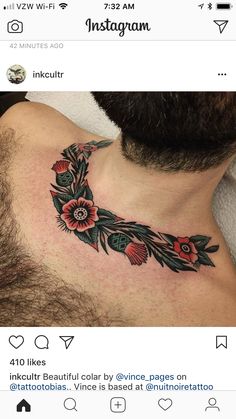 a man with a flower tattoo on his chest