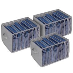 three plastic storage bins filled with blue shirts