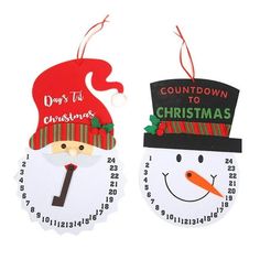 two christmas tags with santa and snowman faces on the front, one has a red hat