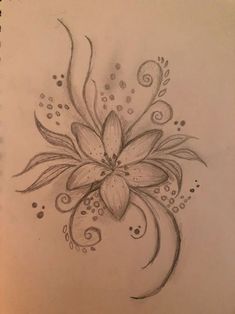 a pencil drawing of a flower with swirls and dots on the bottom half of it