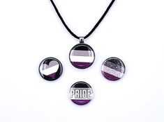 "This unique magnetic necklace comes four interchangeable Asexual Pride button charms that can be swapped out to create four different Asexual necklaces. Mix and match with other pride designs to create your own set of pride jewelry and accessories. Set Includes 1 Magnet Necklace, 1 necklace cord, 4 button charms and 1 charm storage bag. Necklace includes your choice of 18\" cord necklace or 24\" inch rolo chain necklace. Designs Included: Asexual Flag Glitter Asexual Flag Asexual Heart Asexual Aroace Accessories, Abrosexual Ring, Asexual Black Ring, Demisexual Bracelet, Asexual Keychain, Pride Necklace, Magnetic Necklace, Pride Jewellery, Asexual Pride